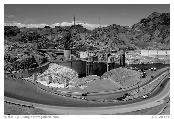 Dam with US 93 route traffic prior to bypass. Hoover Dam, Nevada and Arizona (black and white)