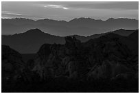 Whitney Pocket rocks and mountain ranges at sunset. Gold Butte National Monument, Nevada, USA ( black and white)