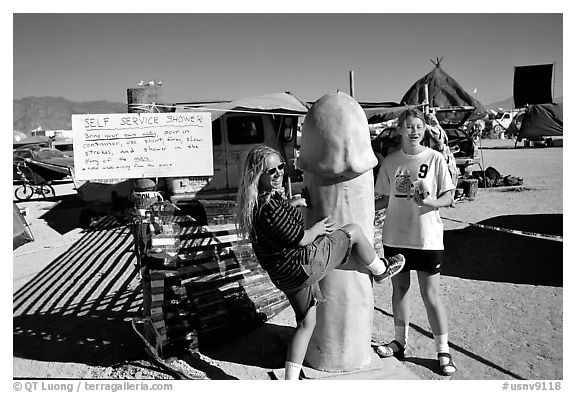 Phallic shower during the Burning Man festival. Nevada, USA (black and white)