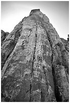Tall sandstone wall with rock climbers. Red Rock Canyon, Nevada, USA ( black and white)