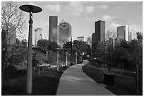 Path in park and skyline. Houston, Texas, USA ( black and white)