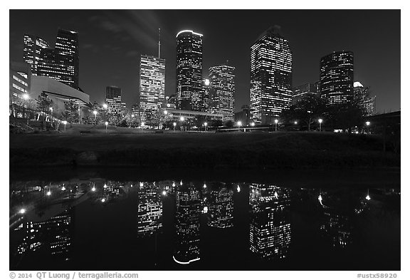 Dowtown skyline and reflection at night. Houston, Texas, USA (black and white)