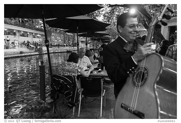 Musician on Riverwalk. San Antonio, Texas, USA (black and white)