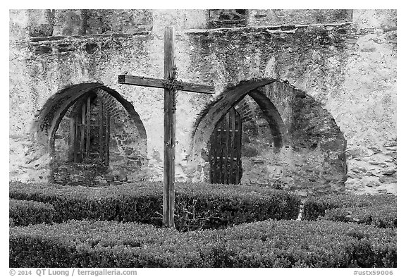 Cross in courtyard, Mission San Jose. San Antonio, Texas, USA (black and white)