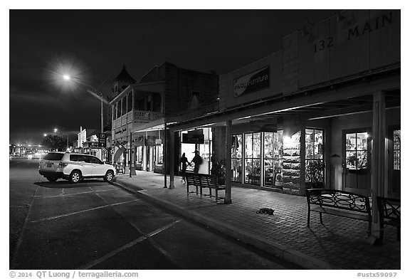 Stores at night. Fredericksburg, Texas, USA (black and white)