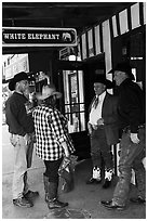 Group in front of White Elephant bar. Fort Worth, Texas, USA ( black and white)