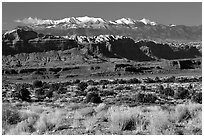 Sandstone cliffs and Henry mountains. Utah, USA ( black and white)