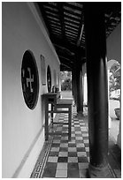 Gallery outside Giac Vien Pagoda with svastikas, district 11. Ho Chi Minh City, Vietnam ( black and white)