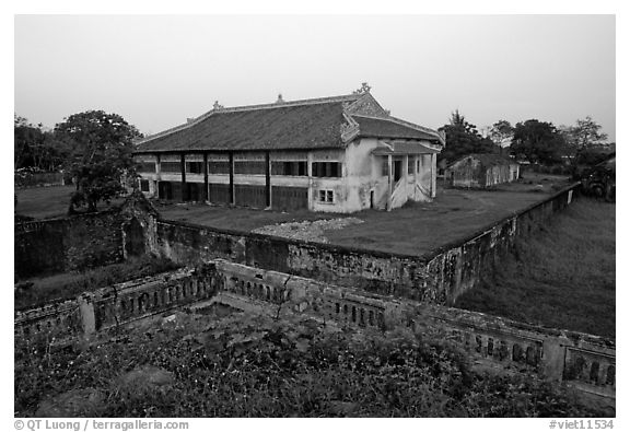 Building amongst gardens, Hue citadel. Hue, Vietnam (black and white)