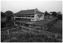 Building amongst gardens, Hue citadel. Hue, Vietnam (black and white)