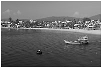 Basket boat, fishing boat, and beach, Duong Dong. Phu Quoc Island, Vietnam ( black and white)