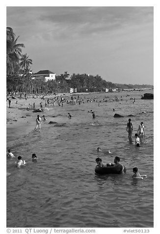 Water play on Long Beach, Duong Dong. Phu Quoc Island, Vietnam (black and white)