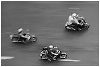 Motorbike riders seen from above with speed blur. Ho Chi Minh City, Vietnam (black and white)
