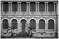 Facade of courthouse with blue doors and windows. Ho Chi Minh City, Vietnam ( black and white)