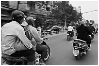 Motorcycle traffic seen from a motorcyle in motion. Ho Chi Minh City, Vietnam (black and white)