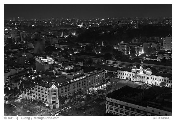 Peoples Committee building and Rex Hotel at night. Ho Chi Minh City, Vietnam (black and white)