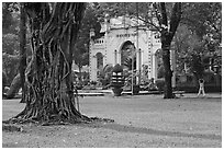 Tree, lawn, and gate, Cong Vien Van Hoa Park. Ho Chi Minh City, Vietnam (black and white)