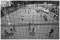 Stadium with girls team athetics, Van Hoa Park. Ho Chi Minh City, Vietnam ( black and white)