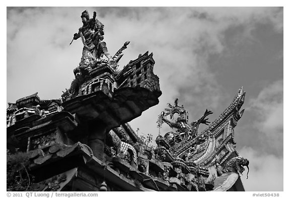 Ceramic figures on roof, Quan Am Pagoda. Cholon, District 5, Ho Chi Minh City, Vietnam (black and white)