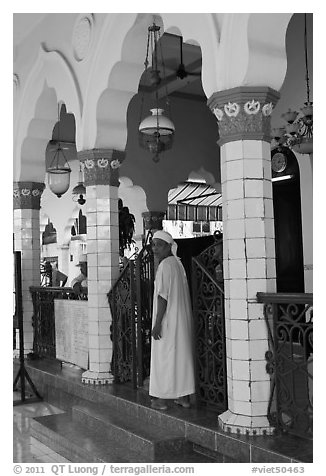 Muslim man in worship attire, Cholon Mosque. Cholon, District 5, Ho Chi Minh City, Vietnam (black and white)