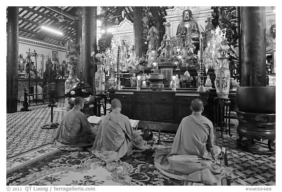 Buddhist monks perform ceremony, Giac Lam Pagoda, Tan Binh District. Ho Chi Minh City, Vietnam (black and white)