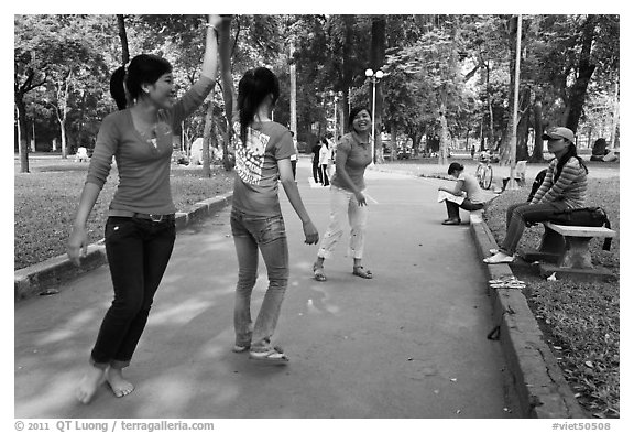 Young women practising dance, Cong Vien Van Hoa Park. Ho Chi Minh City, Vietnam (black and white)