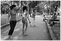 Young women practising dance, Cong Vien Van Hoa Park. Ho Chi Minh City, Vietnam (black and white)