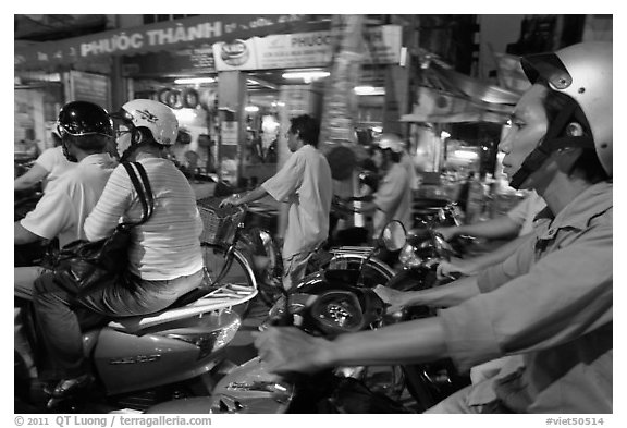 Motorcyle riders in traffic gridlock. Ho Chi Minh City, Vietnam (black and white)
