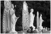 Three Buddhist statues. Ta Cu Mountain, Vietnam (black and white)