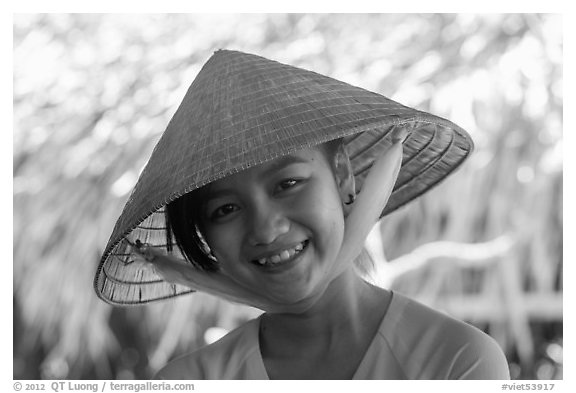 Portrait of girl with conical hat, Phoenix Island. My Tho, Vietnam (black and white)