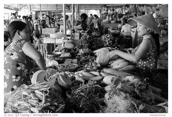 Buying and selling vegetable inside covered market, Cai Rang. Can Tho, Vietnam (black and white)