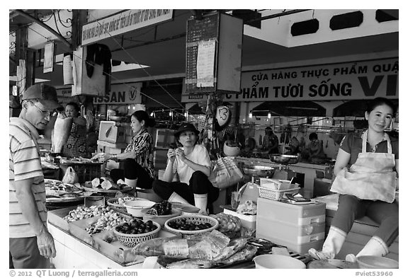 Vendors in Ben Thanh market. Ho Chi Minh City, Vietnam (black and white)