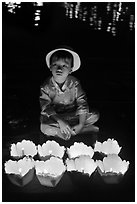 Boy with candle lanterns for sale. Hoi An, Vietnam ( black and white)