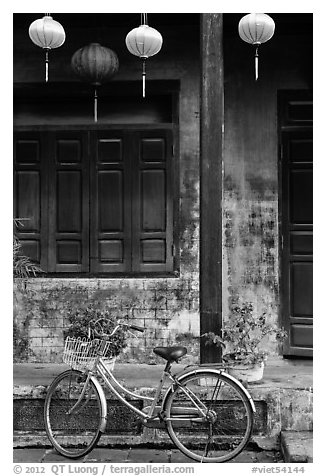 Bicycle and facade with lanterns. Hoi An, Vietnam (black and white)