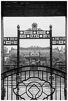 Palace of Supreme Peace viewed from gate in the rain. Hue, Vietnam ( black and white)