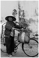 Elderly woman with bicycle, Thanh Toan. Hue, Vietnam (black and white)