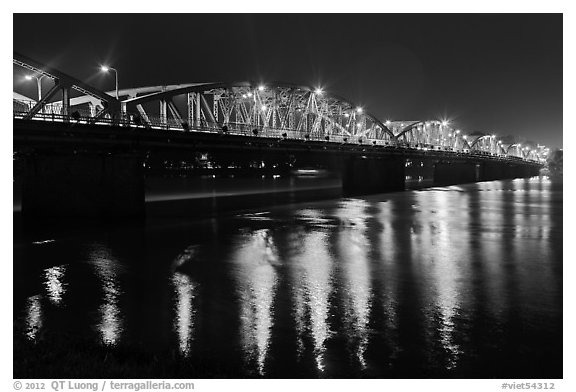 Eiffel-designed Trang Tien Bridge at night. Hue, Vietnam
