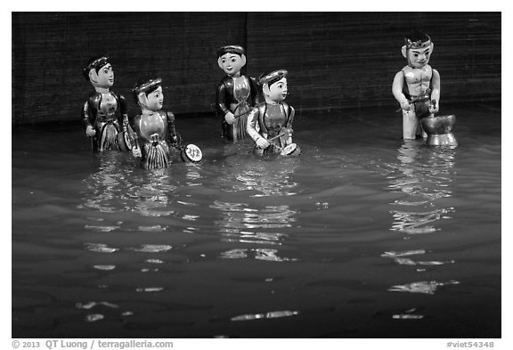 Water puppets (5 characters with musical instruments), Thang Long Theatre. Hanoi, Vietnam
