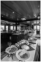 Pho buffet in tour boat dining room. Halong Bay, Vietnam (black and white)