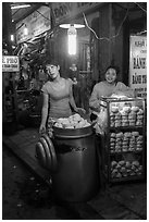 Dumpling vendors at night, old quarter. Hanoi, Vietnam ( black and white)
