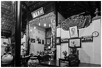 Wall with various pictures in Giac Lam Pagoda, Tan Binh district. Ho Chi Minh City, Vietnam (black and white)