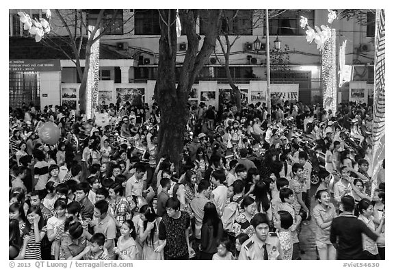 Street with Christmas eve crowds. Ho Chi Minh City, Vietnam (black and white)