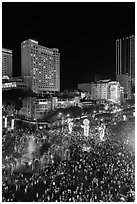 Packed Nguyen Hue boulevard on Christmas eve from above. Ho Chi Minh City, Vietnam (black and white)