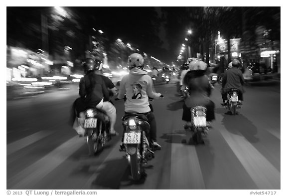 Motorbike riders at night from riders perspective. Ho Chi Minh City, Vietnam (black and white)