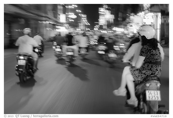 Riders view of motorcycle traffic blurred by speed. Ho Chi Minh City, Vietnam