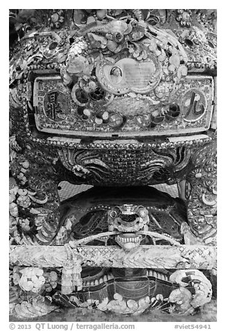 Funerary urn resting on a tortoise sculpture, Phoenix Island. My Tho, Vietnam (black and white)