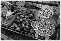 Vegetables and fruit for sale on boat, Phung Diem. Can Tho, Vietnam (black and white)