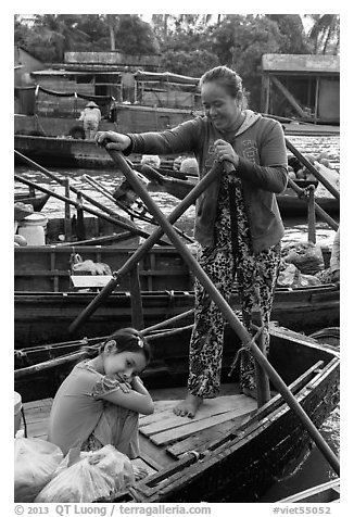 Woman and girl, Phung Diem floating market. Can Tho, Vietnam