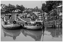 Boats loaded with bricks. Can Tho, Vietnam (black and white)