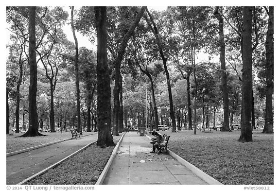 Couple looking at mobile phone, April 30 Park. Ho Chi Minh City, Vietnam (black and white)